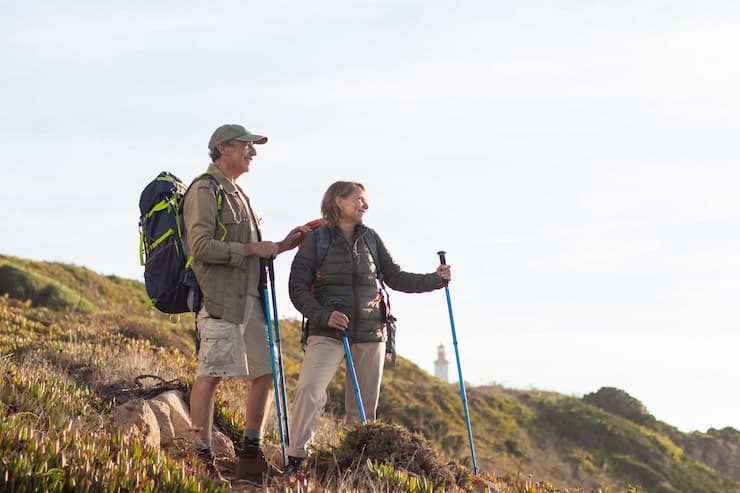Older couple hiking outdoors